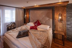 Postel nebo postele na pokoji v ubytování Boutique Hotel die Mittagspitze Superior