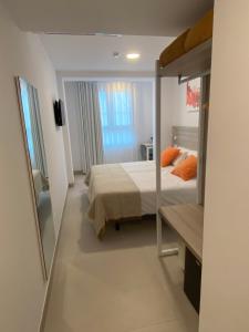 Postel nebo postele na pokoji v ubytování Hotel Sunna Benicassim