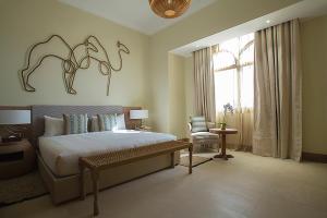 Voodi või voodid majutusasutuse Liwa Hotel toas