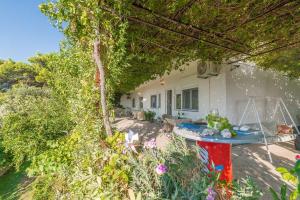 Vonkajšia záhrada v ubytovaní Apartments Blaženka
