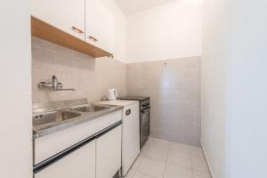 Kuchyňa alebo kuchynka v ubytovaní Apartments Blaženka