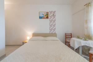 Posteľ alebo postele v izbe v ubytovaní Apartments Blaženka