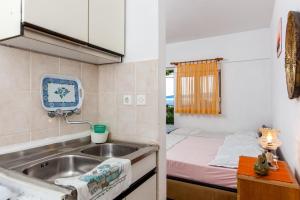 Posteľ alebo postele v izbe v ubytovaní Apartments Blaženka