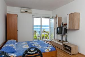 Posteľ alebo postele v izbe v ubytovaní Apartments Blaženka