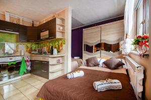 En eller flere senger på et rom på Apartamenty w Centrum - Zakopane