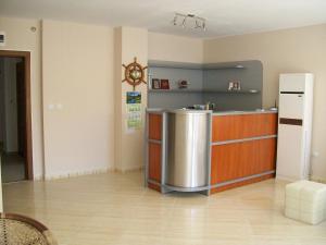 Kuchyň nebo kuchyňský kout v ubytování Guest House Donchevi