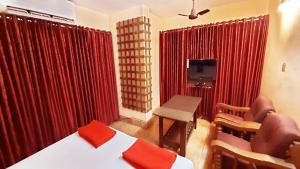 Et tv og/eller underholdning på Sree Rama Lodge