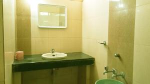 Et badeværelse på Sree Rama Lodge