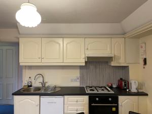 Cucina o angolo cottura di An Stór Townhouse
