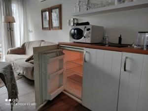 Kuchyň nebo kuchyňský kout v ubytování B&B Het Zwanennest