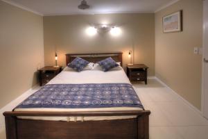 Кровать или кровати в номере View Pacific Apartments