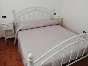 Postel nebo postele na pokoji v ubytování Villa Murgia