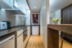 A kitchen or kitchenette at Pierre & Vacances Apartamentos Edificio Eurobuilding 2