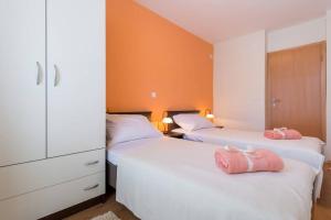 Postel nebo postele na pokoji v ubytování Apartment Magnolia
