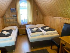 Postel nebo postele na pokoji v ubytování Rusałka