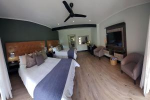 The Guesthouse 6 on Vrede客房内的一张或多张床位