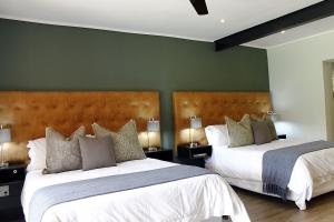 The Guesthouse 6 on Vrede客房内的一张或多张床位