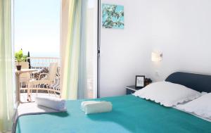 Uma cama ou camas num quarto em Apartments Antonio