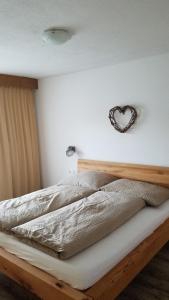 Postel nebo postele na pokoji v ubytování Alpin Appart Reiterhof