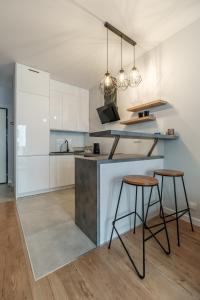 
A kitchen or kitchenette at Inside Warsaw Business Centre

