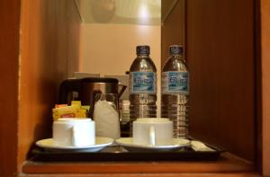 Nápoje v ubytování Omah Qu Guesthouse Malioboro