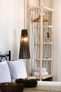 Ένα ή περισσότερα κρεβάτια σε δωμάτιο στο Hotel Thira