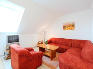 Televízia a/alebo spoločenská miestnosť v ubytovaní Apartment Amarillo 3-3 by Interhome