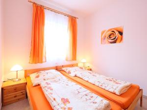 Posteľ alebo postele v izbe v ubytovaní Apartment Amarillo 1 by Interhome