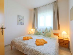 A bed or beds in a room at Apartment Amarillo 2 by Interhome