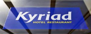 a blue sign that reads kyrld hospital resort at Kyriad Chateauroux in Châteauroux +50 photos