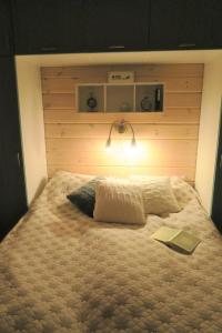 Postel nebo postele na pokoji v ubytování Holiday Home Vuosselinrinne 21a by Interhome