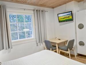 Postel nebo postele na pokoji v ubytování Holiday Home Weekend duo by Interhome