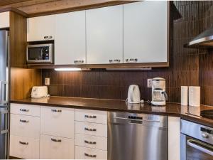 Kuchyň nebo kuchyňský kout v ubytování Holiday Home Lumikellomaa by Interhome