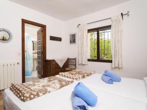 A bed or beds in a room at Holiday Home Pedro by Interhome