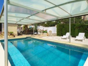 The swimming pool at or close to Holiday Home Pedro by Interhome