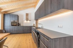 Kuchyň nebo kuchyňský kout v ubytování Chalet Allgäublick