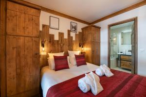 Postel nebo postele na pokoji v ubytování Superbe appart Arc 1950 4/6pers dans résidence hôtelière 5* - Skis aux pieds