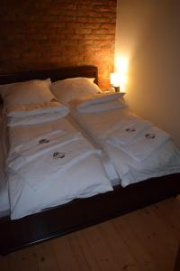 Een bed of bedden in een kamer bij Etno Lux