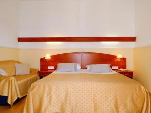 En eller flere senge i et værelse på Apartment Ana-1 by Interhome + 18 billeder