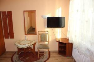 Telewizja i/lub zestaw kina domowego w obiekcie Hotel Czardasz