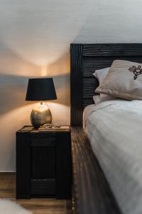 Postel nebo postele na pokoji v ubytování Ostoja Zaskalskie Apartament RUBIN 52 m2