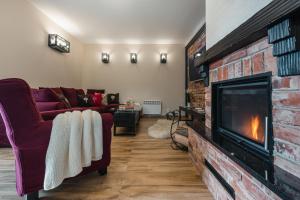 Posezení v ubytování Ostoja Zaskalskie Apartament RUBIN 52 m2