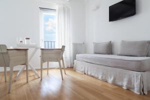 Postel nebo postele na pokoji v ubytování La Malà - camere di charme