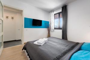 Posteľ alebo postele v izbe v ubytovaní Apartament Scandinavia