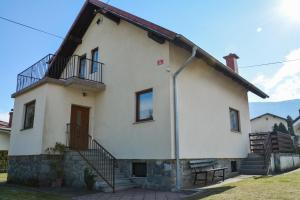 a large white house with stairs on it at House Marin - whole house in Maribor