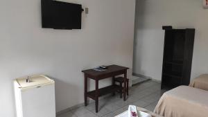 Televisyen dan/atau pusat hiburan di Pousada Barcelos