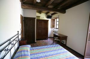 Giường trong phòng chung tại Affittacamere Dall'Acquarone