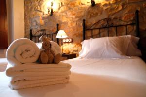 A bed or beds in a room at Complejo Rural Turimaestrat