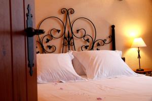 A bed or beds in a room at Complejo Rural Turimaestrat