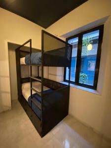 Postel nebo postele na pokoji v ubytování JOY Setas Coworking